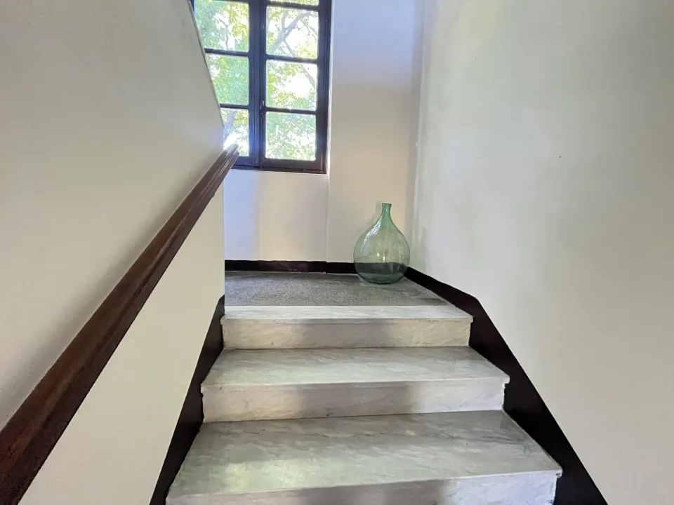 Staircase with a wooden handrail